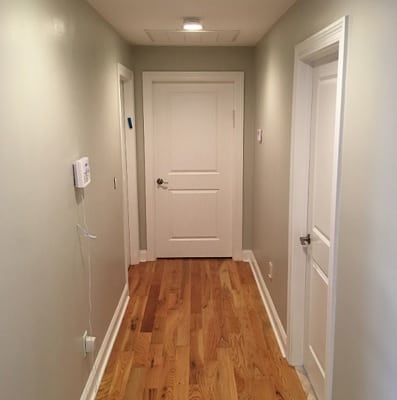 painted Agreeable Gray Hallway with doors