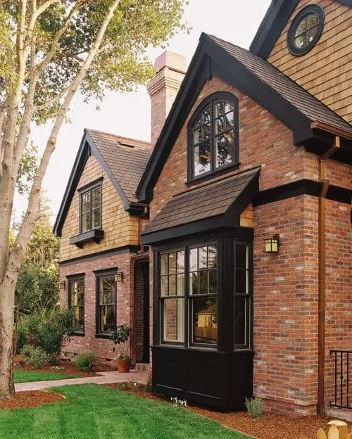 Brick home exterior with black accents