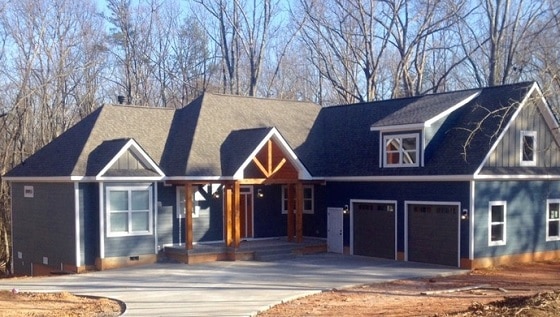  home with two car garage painted Newburg Green Exterior