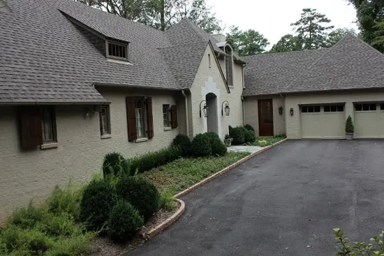 Large home Exterior with a 2 car garage