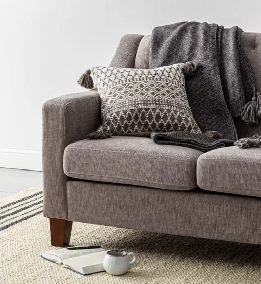 gray couch and rug
