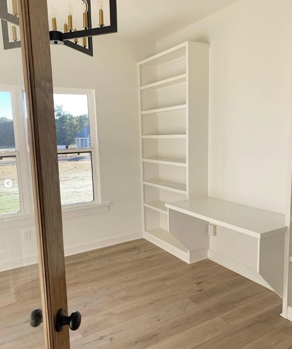 empty office with built in bookcase