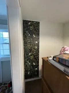 first peice of  peel & stick wallpaper on wall