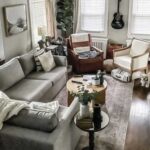 living room with gray couch and gray walls