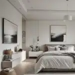 modern bedroom with cozy bed and night stand and artwork in neutral colors