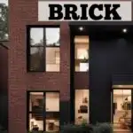 house with brick and black siding - pinterest graphic