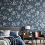 simple bedroom with blue floral wall paper and bed