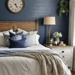 farmhouse style bedroom with bed and blue shiplap