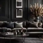 dark neutral living room with dark walls and couch