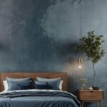 moody blue bedroom with bed, blue wallpaper and night stand