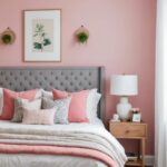 small Bedroom with bed, pink walls and wall decor
