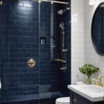 Bathroom with navy blue shower subway tile