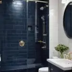 Bathroom with navy blue shower subway tile