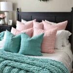 Romantic Master Bedroom with aqua buffalo check pillows and a pink DIY arm knit blanket pinterest graphic