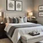 _guest bedroom with bed, night stands, wall art and bench at the foot of then bed