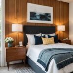 mid century modern guest bedroom with night stands, lamps and wood accent wall