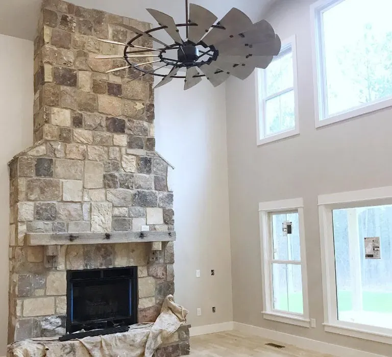 Crushed Ice walls in great room with stone fire place