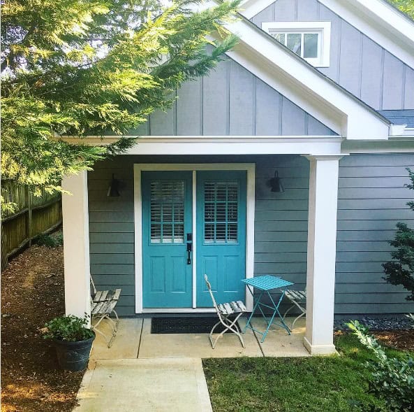 Exterior of a Bungalow home Exterior Gauntlet Gray Trim Eider White Doors Peacock plume