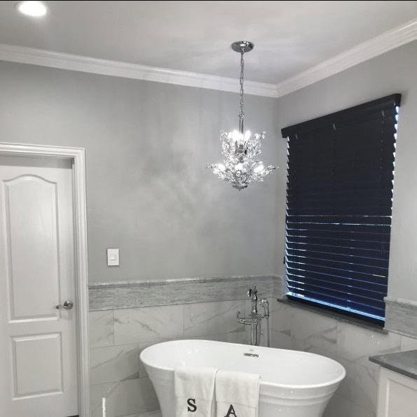 bathroom with freestanding tub and Eider White Trim and Big Chill walls