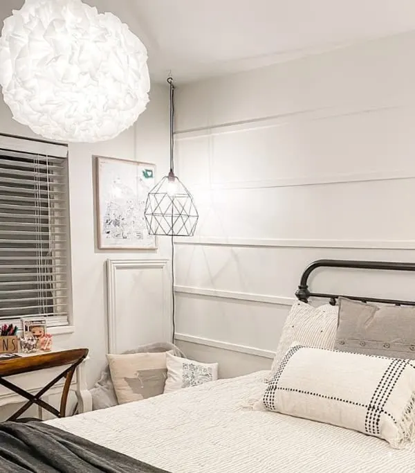 bedroom with bed, ikea light fixture and White  panted walls