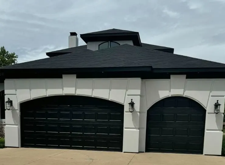 big chill siding and tricorn trim and garage doors on exterior of a home