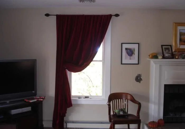 living room with window and red curtain