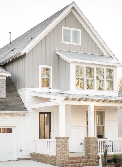 two story home with porch and paint colors Eider White and Dorian Gray