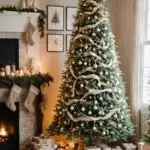 A room decorated for Christmas with neutral colors and a christmas tree draped with burlap ribbons, macramé garlands, or pearl-like beads