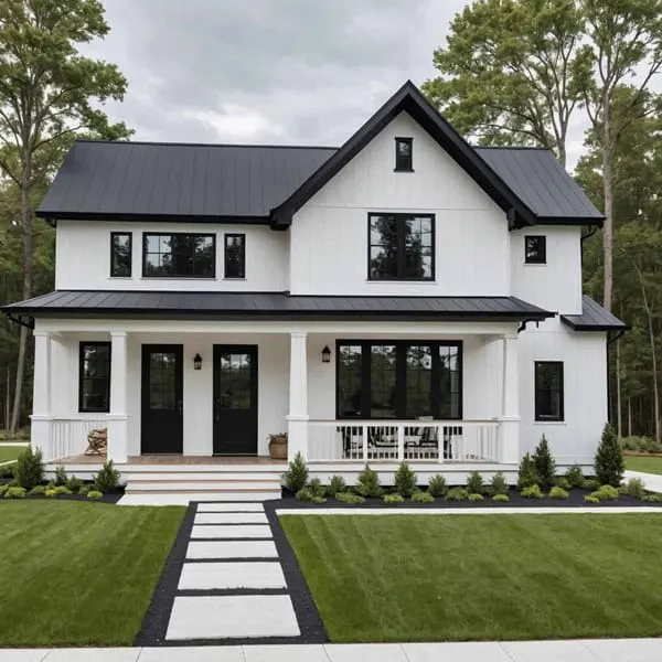 Modern Farmhouse style exterior with a cool white with a matte black roof and trim.