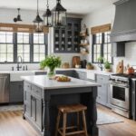 large kitchen with blue gray cabinets, island, and wood floors