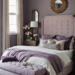 A moody romantic, neutral bedroom with light purple accents