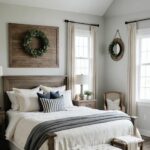 Bedroom with a bed, ceiling fan, and windows