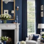 living room with dark blue walls, high ceilings, seating area and fireplace