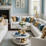 traditional style living room with light blue walls, white sectional couch with blue and gold pillows and fireplace