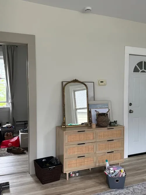 dining room with dresser, mirror and door