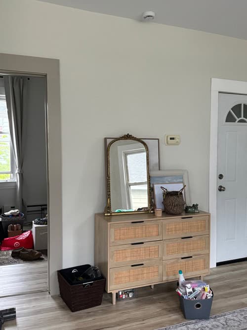 dining room with dresser, mirror and door
