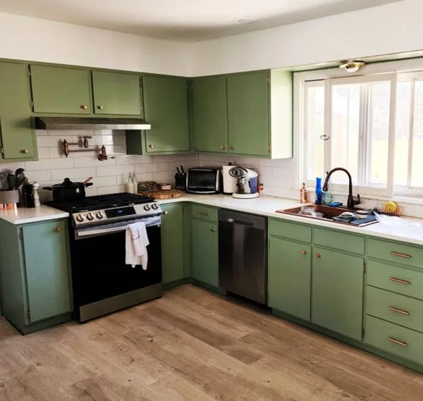 Kitchen with cabinets painted PPG Farm Fresh