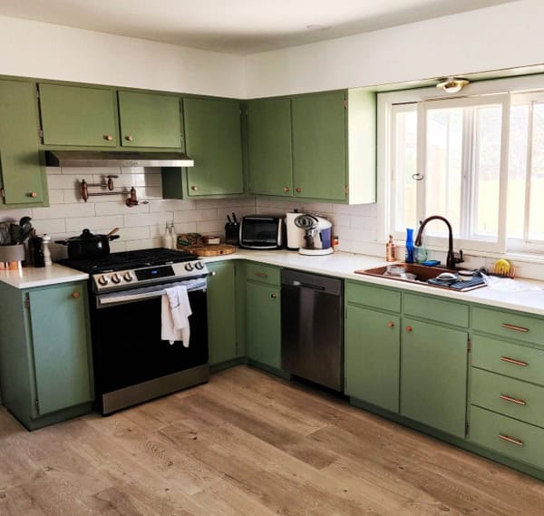 Kitchen with cabinets painted PPG Farm Fresh